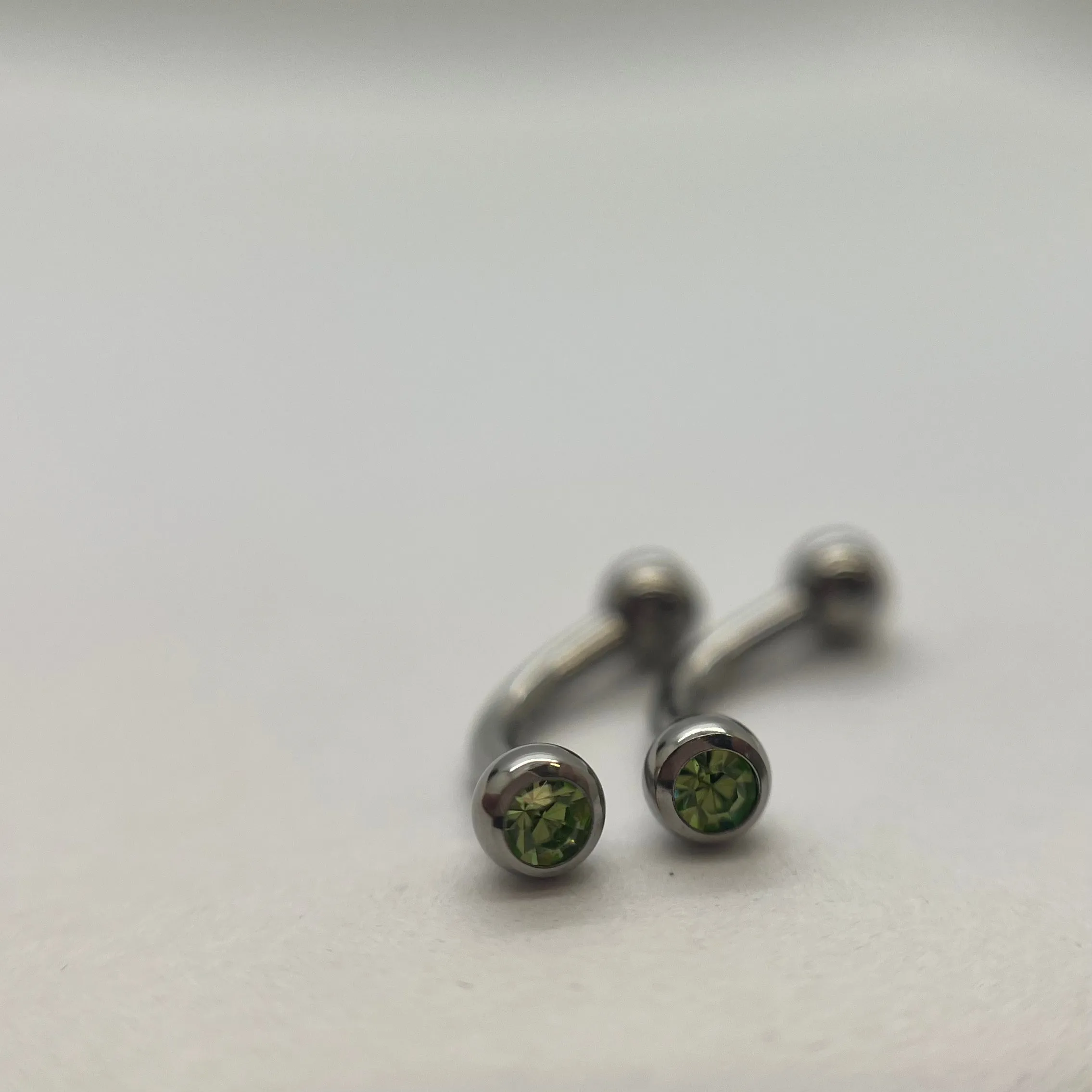 16g 5/16 Stainless Steel Curved Barbell with CZ (8mm) perfect for eyebrow piercings